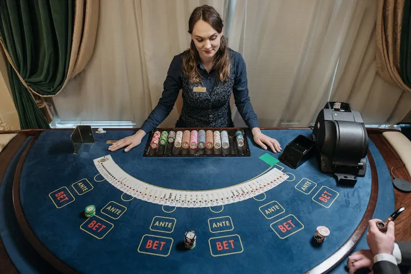 casino dealer dealing cards