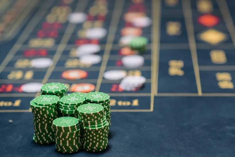 casino chips betting stack tall green felt