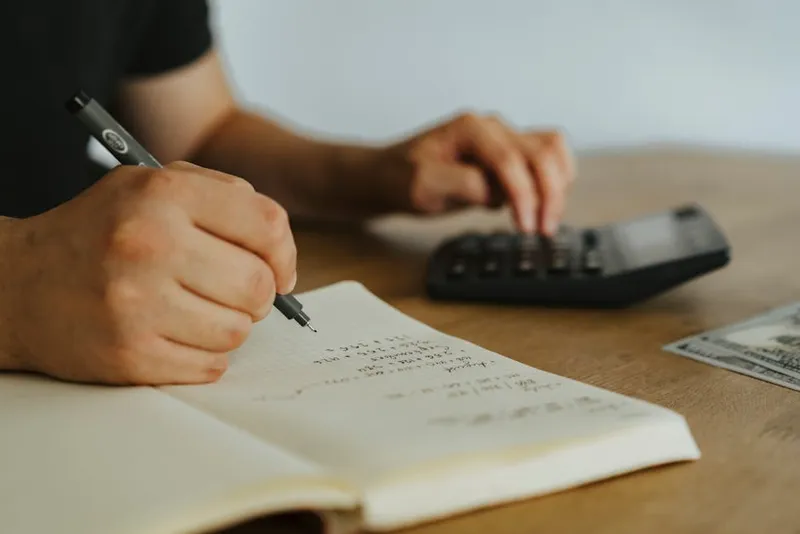 calculator money notebook math desk