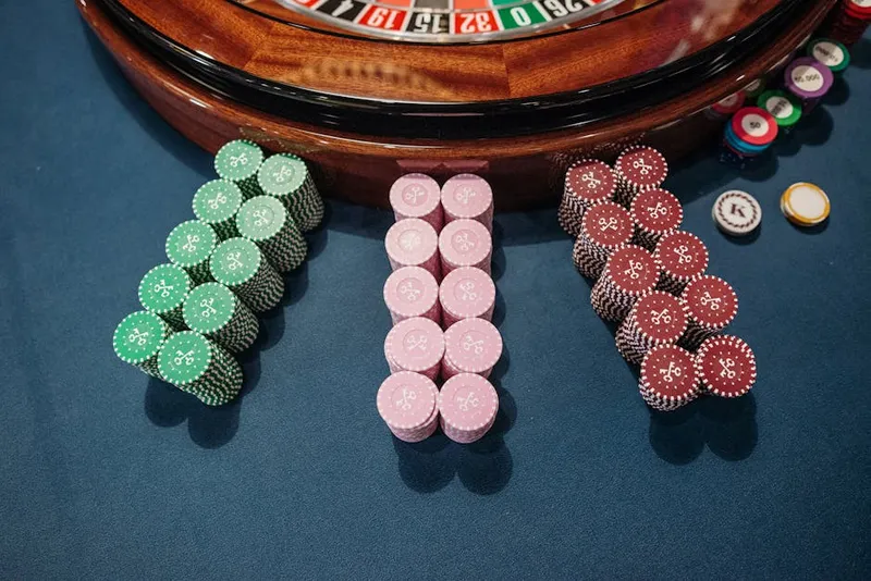 casino chip stack tall green felt